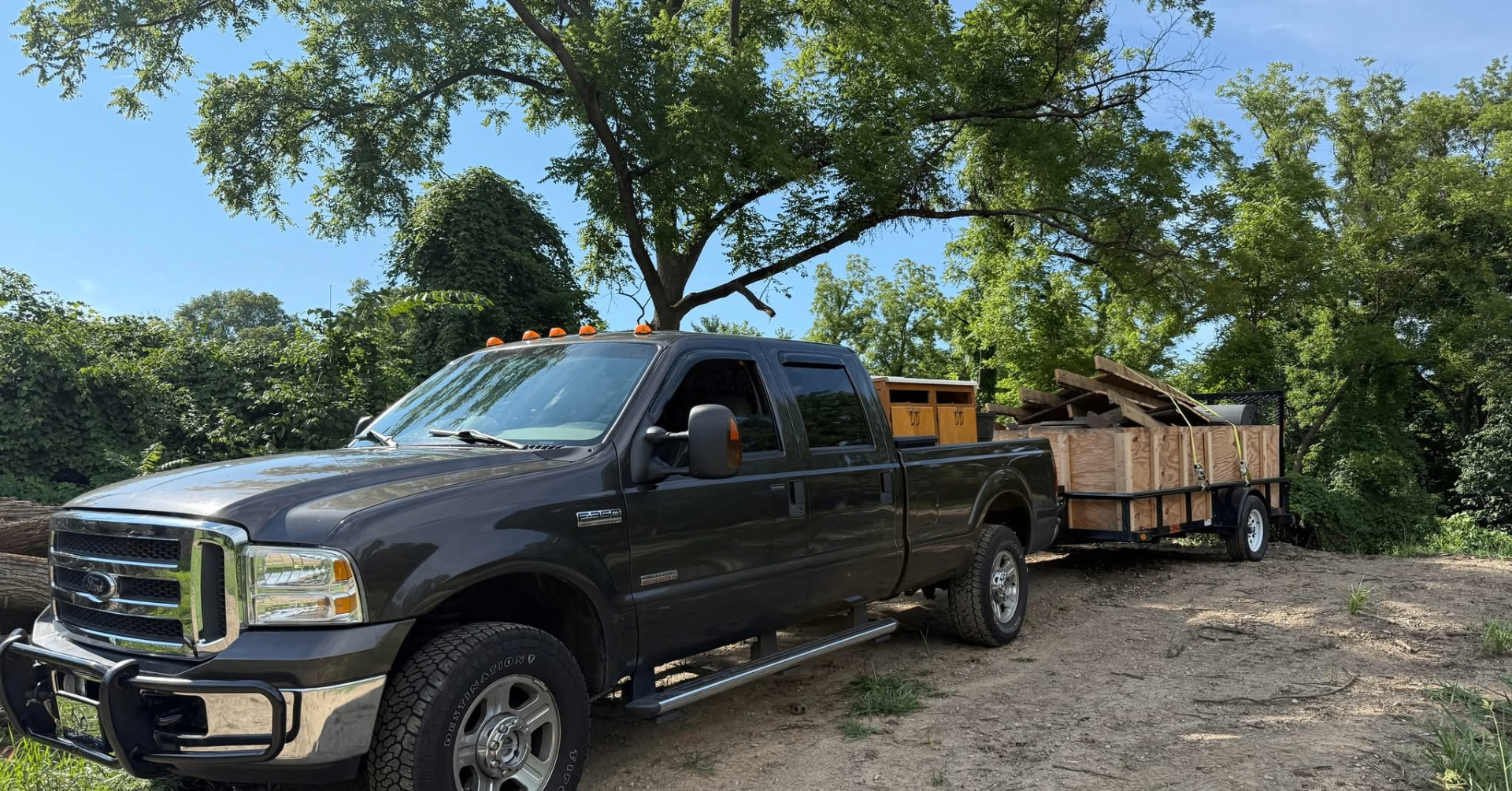 Collier's truck and trailer loaded with debris from a Fort Wayne job